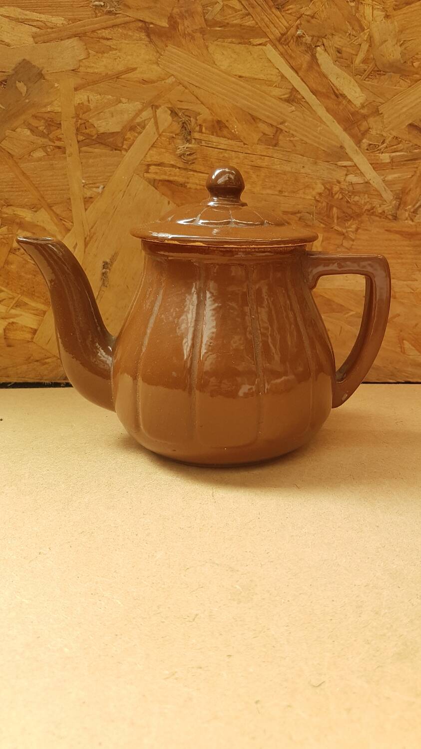 Old vintage brown ceramic romeo teapot