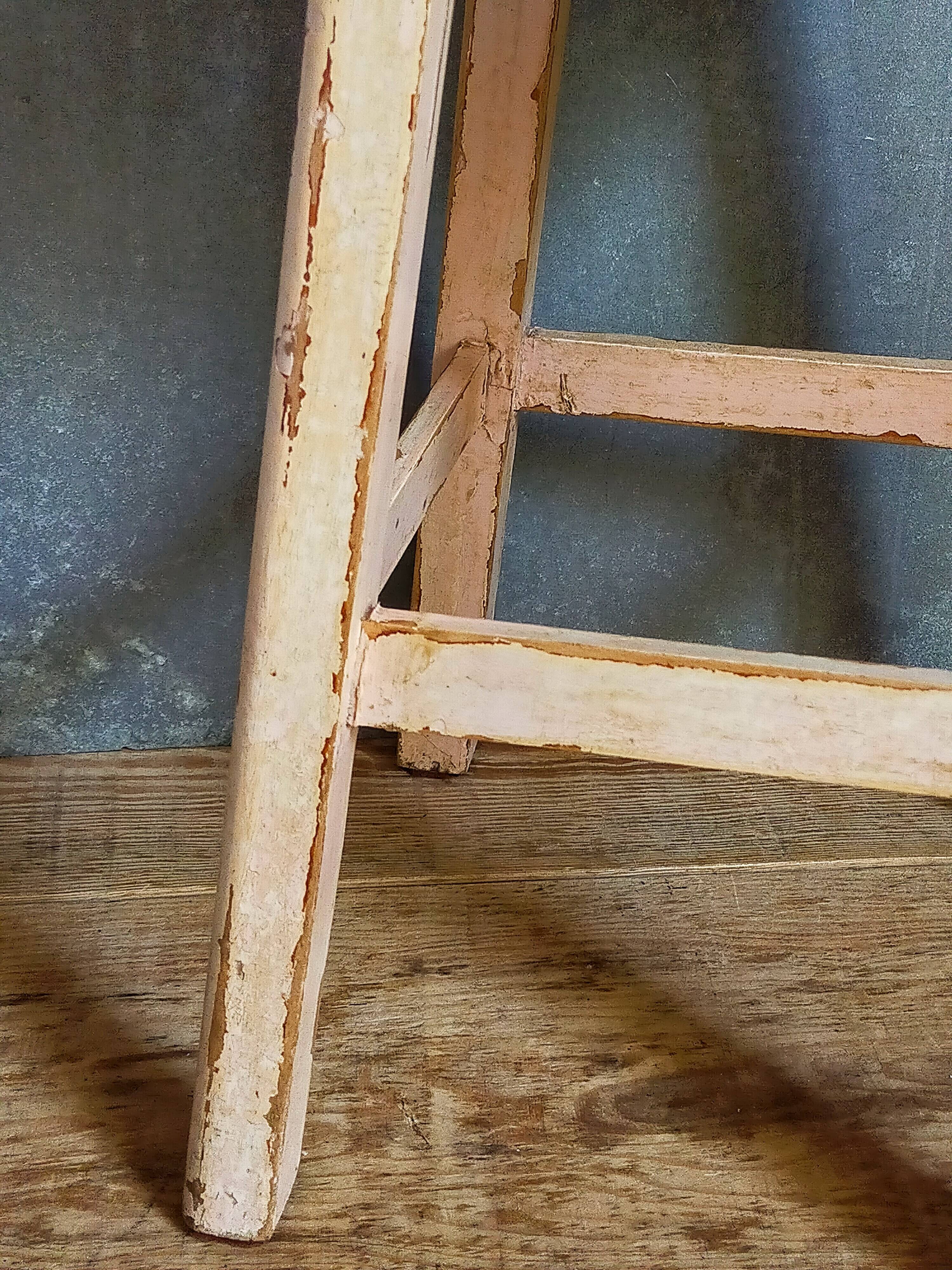 Antique workshop stool in patinated solid wood