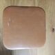 Caramel skaï stool and tapered feet in chrome metal