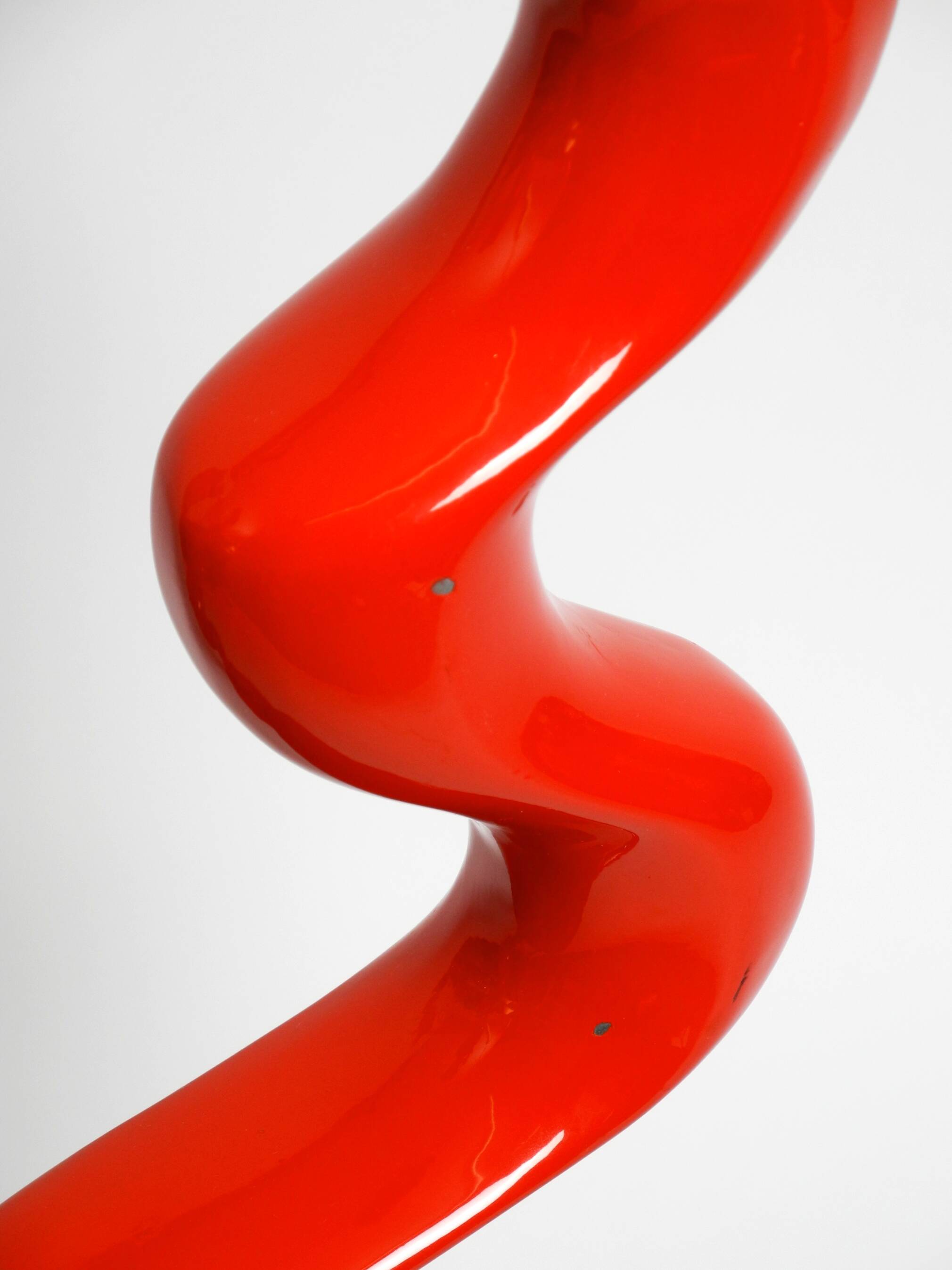 Two large limited abstract metal floor sculptures in red