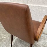 Mid-Century Scandinavian vintage retro armchair with oval armrests.
