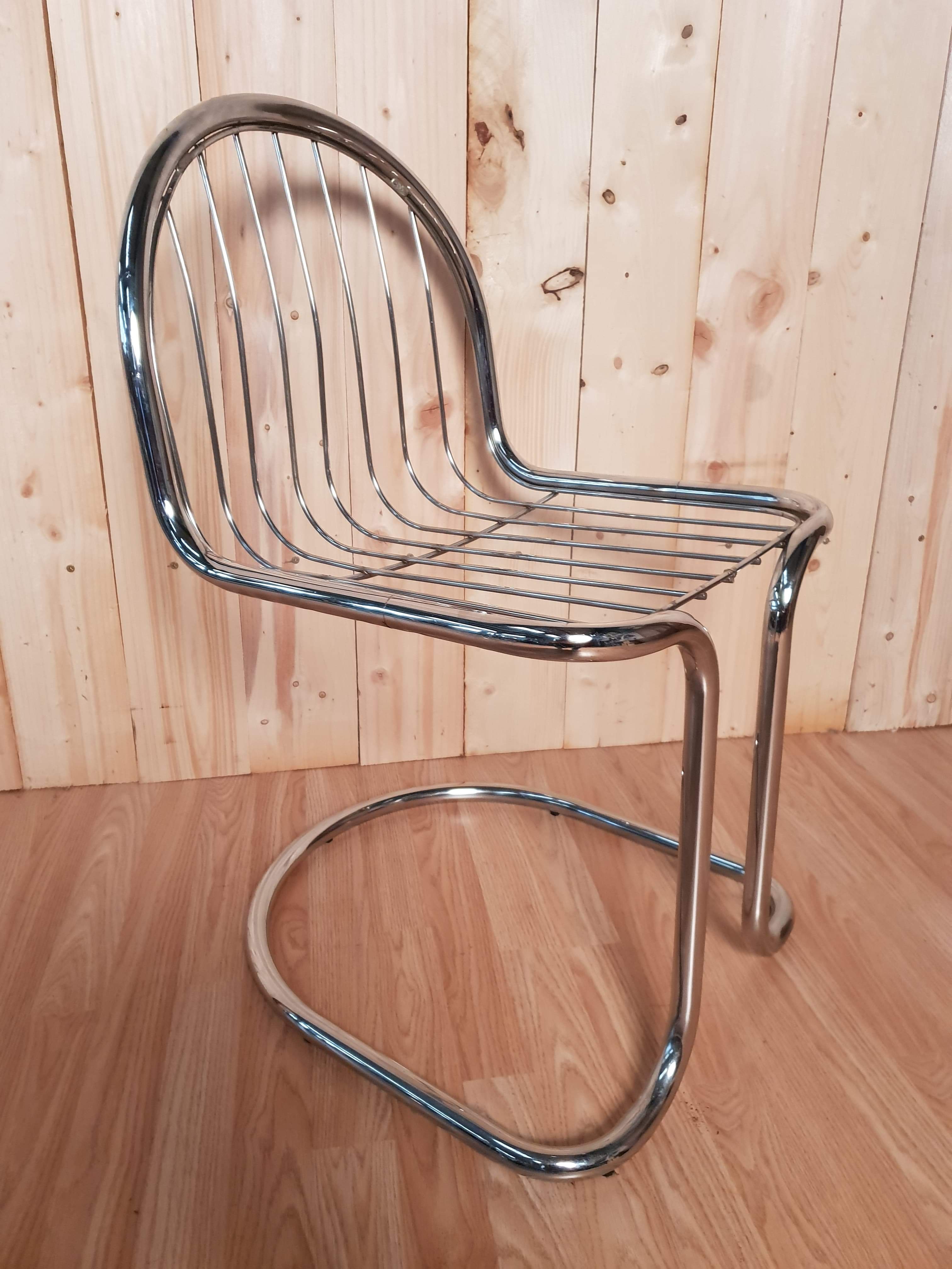 Set of 6 vintage stainless steel rounded chairs