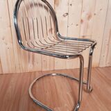 Set of 6 vintage stainless steel rounded chairs