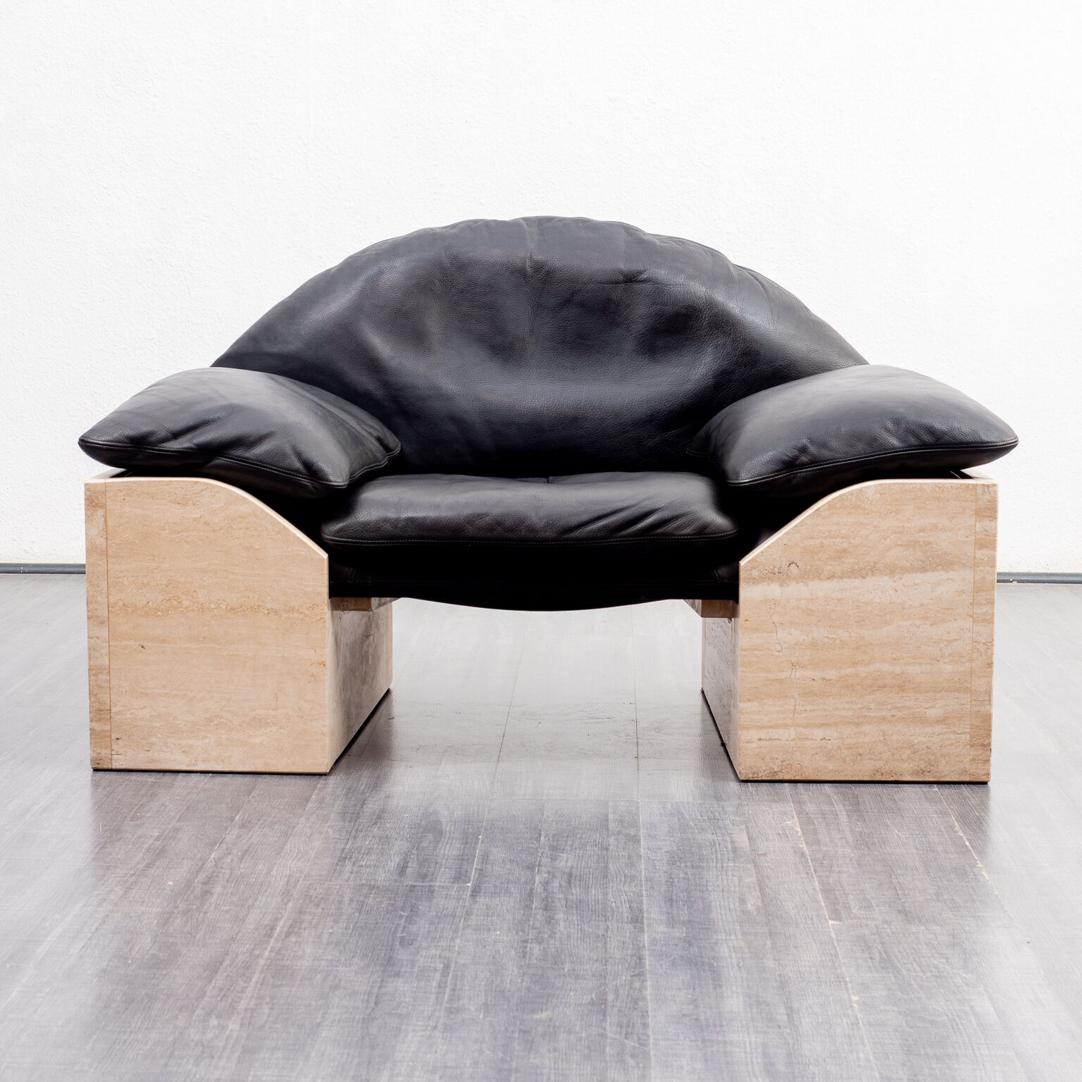 Vintage armchair, leather and travertine