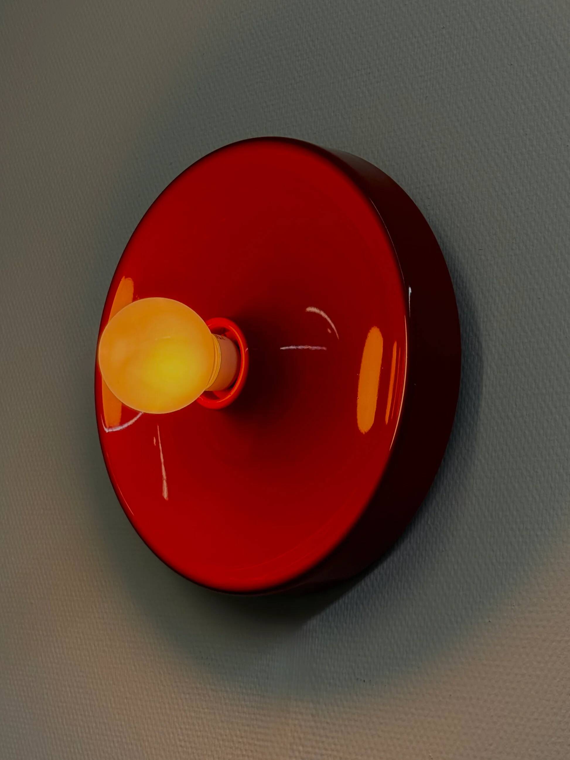 Red space age disc lamp by Enrico Tronconi