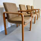 4 armchairs with armrests in beech and fabric, 1970s vintage design.