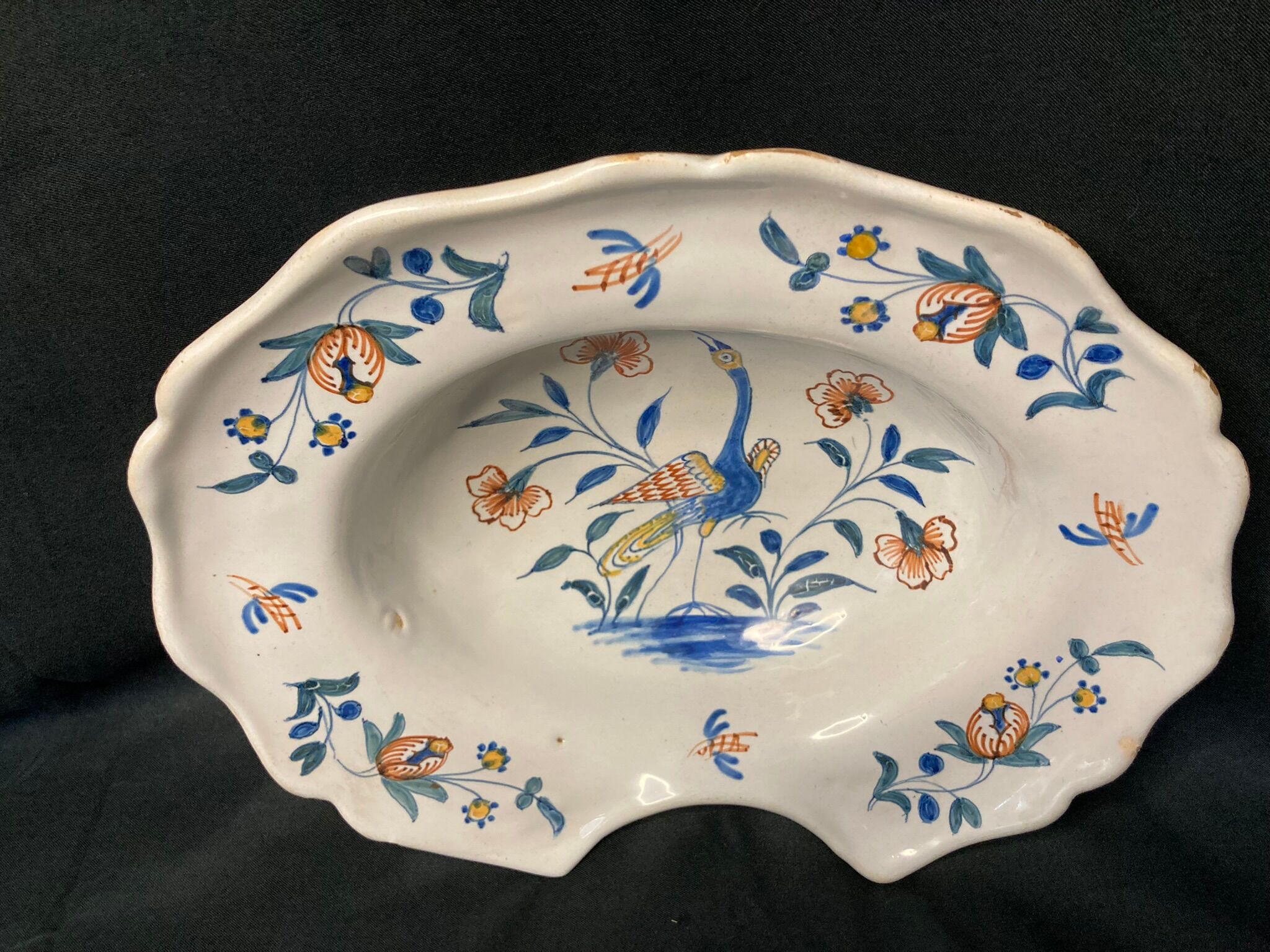 Antique polychrome earthenware shaving dish from La Rochelle, 18th century