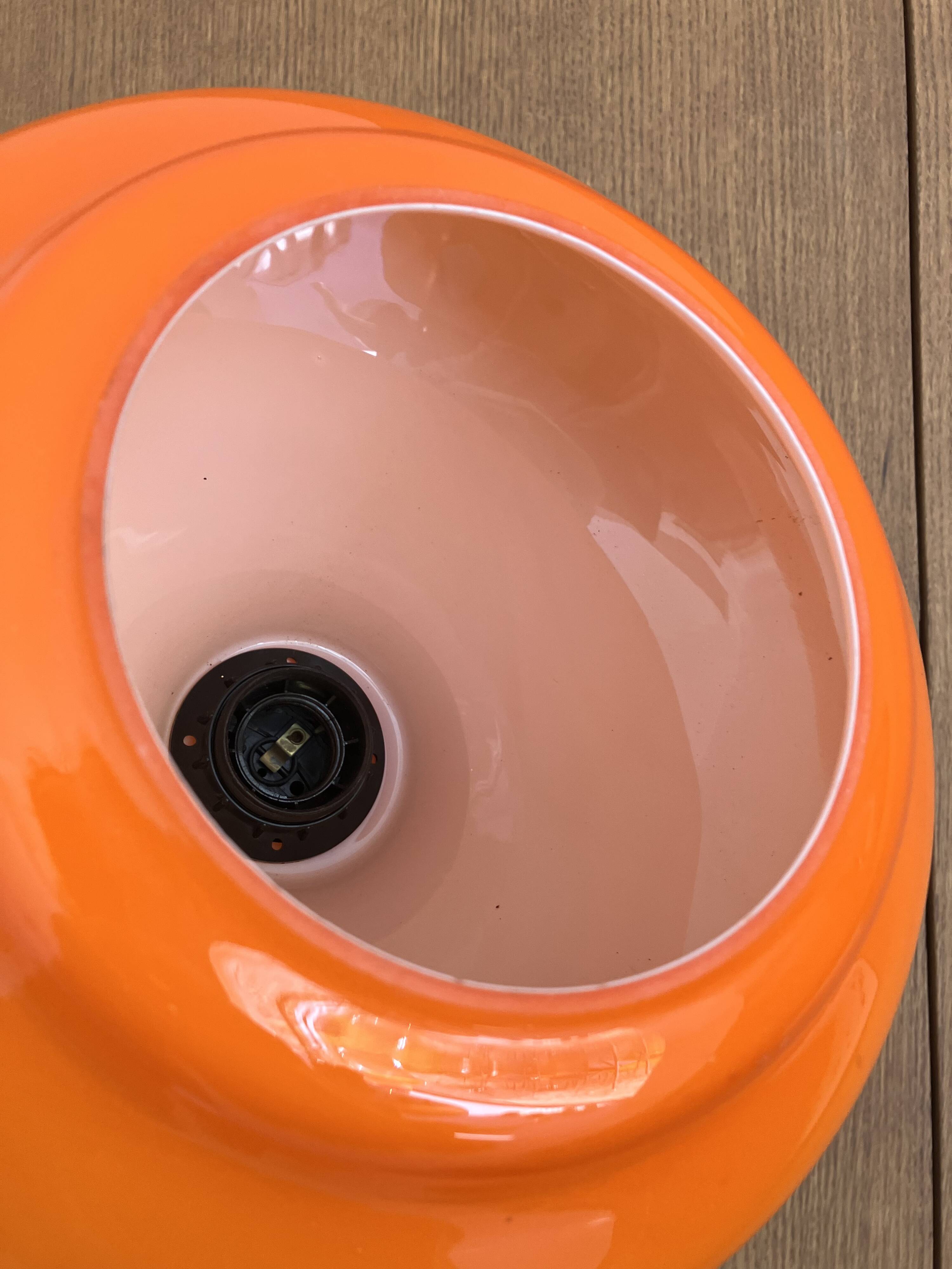 Set of three orange opaline suspensions from the 1970s Space Age.