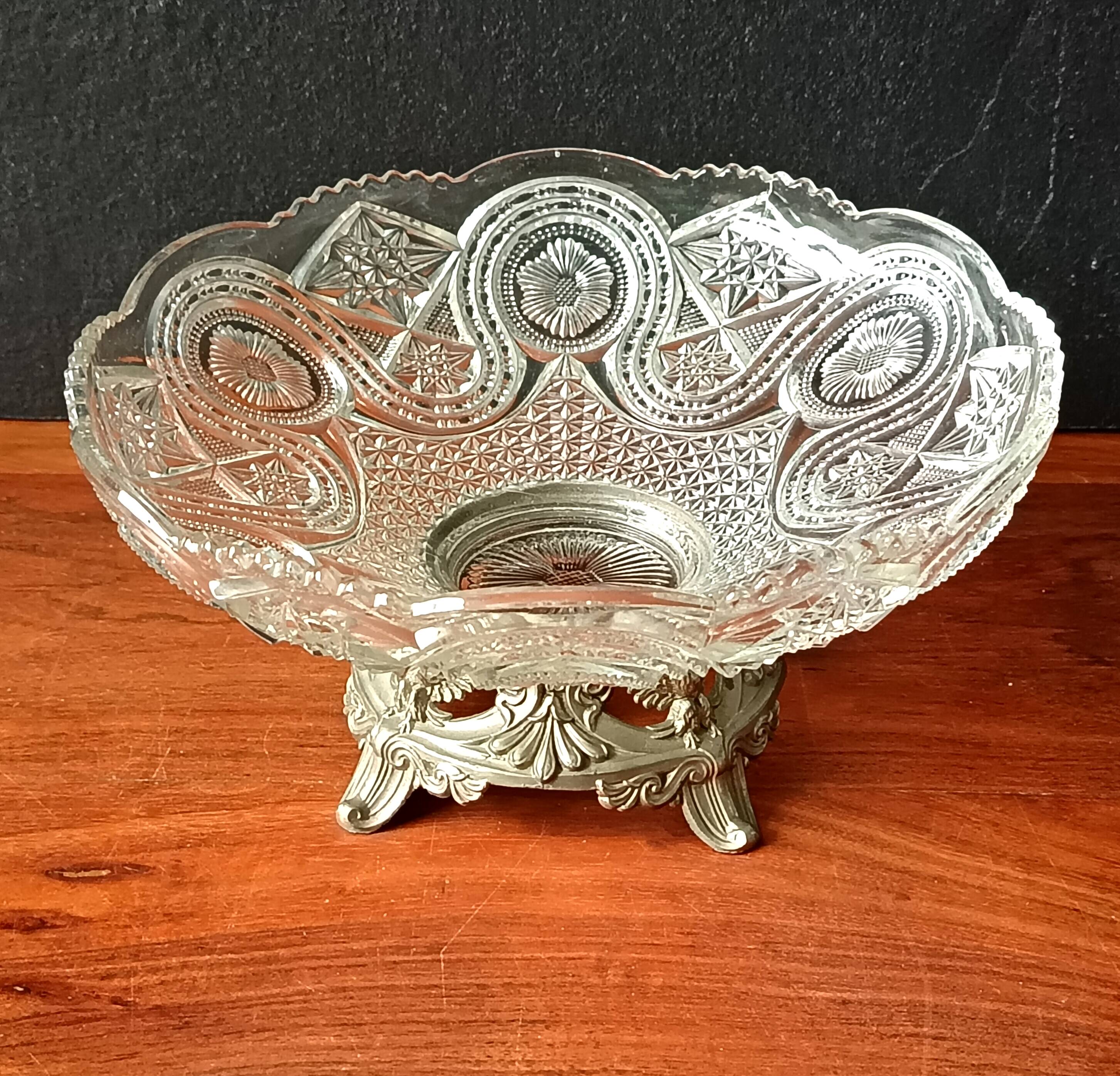 Transparent glass dish on vintage metal stand