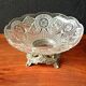Transparent glass dish on vintage metal stand