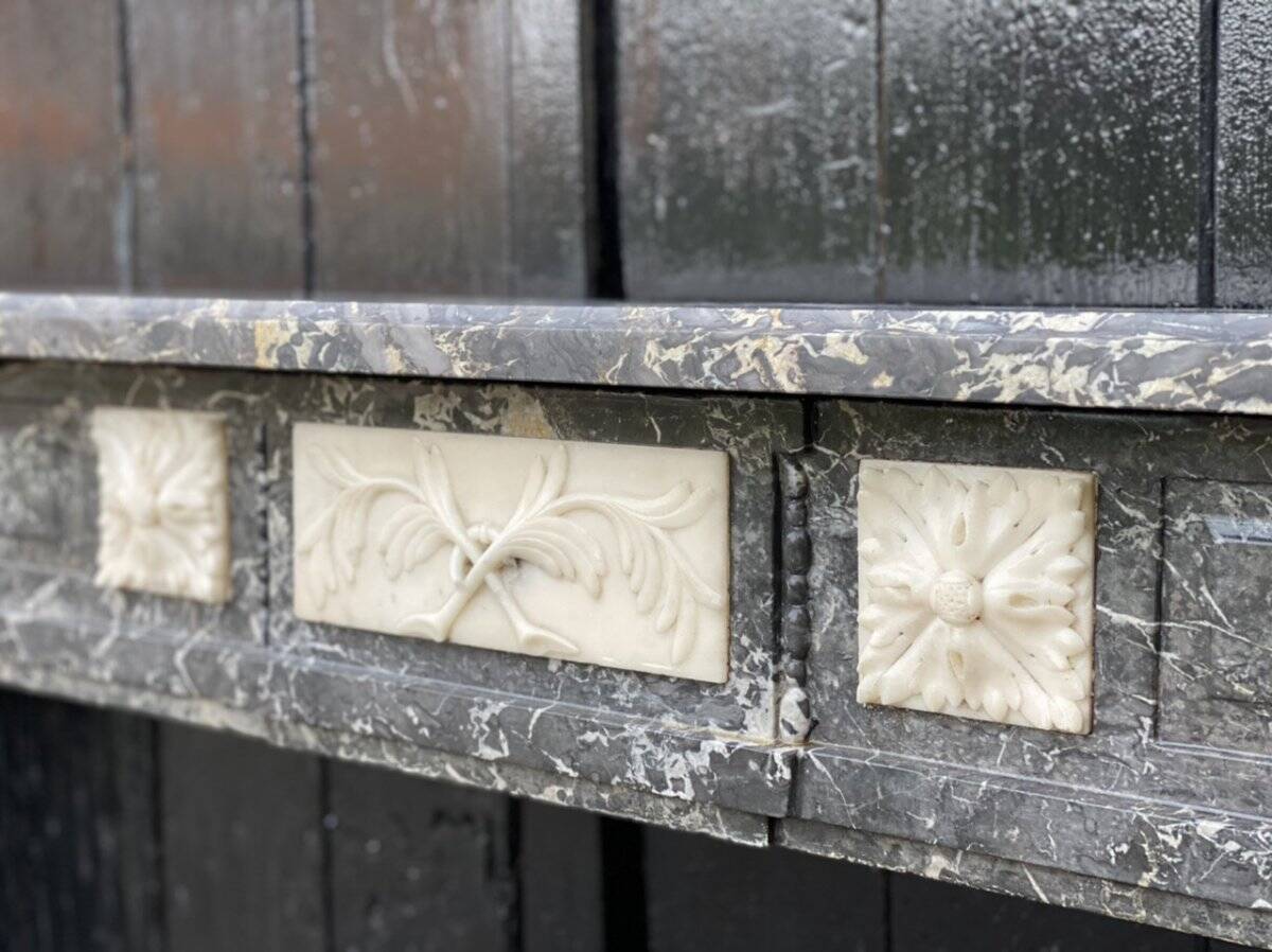Louis XVI style fireplace in grey Saint Anne and white Carrara marble