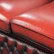 English chesterfield 2.5/3 seater sofa made of cowhide leather in red