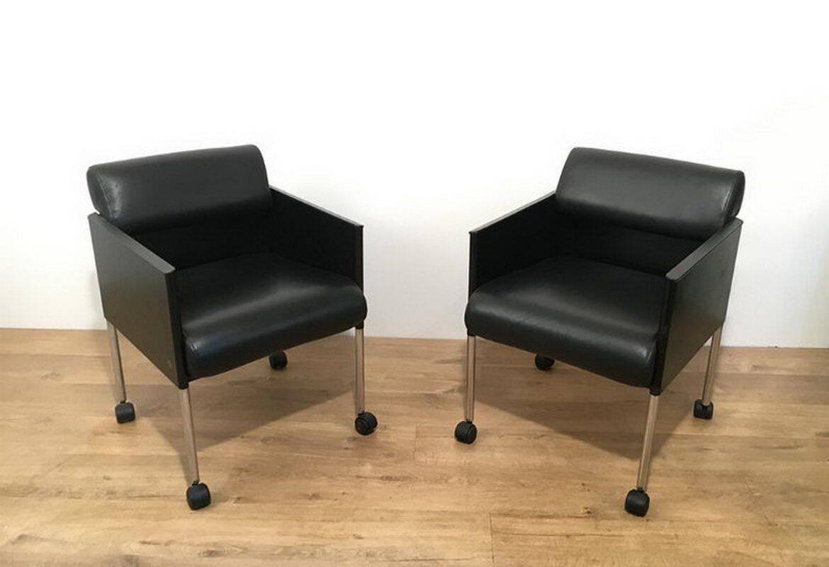 Set of 4 armchairs in leather and black lacquered metal. Rosenthal