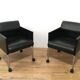 Suite de 4 fauteuils en cuir et métal laqué noir. Rosenthal