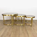 Vintage round nesting tables in gilded bronze with smoked glass