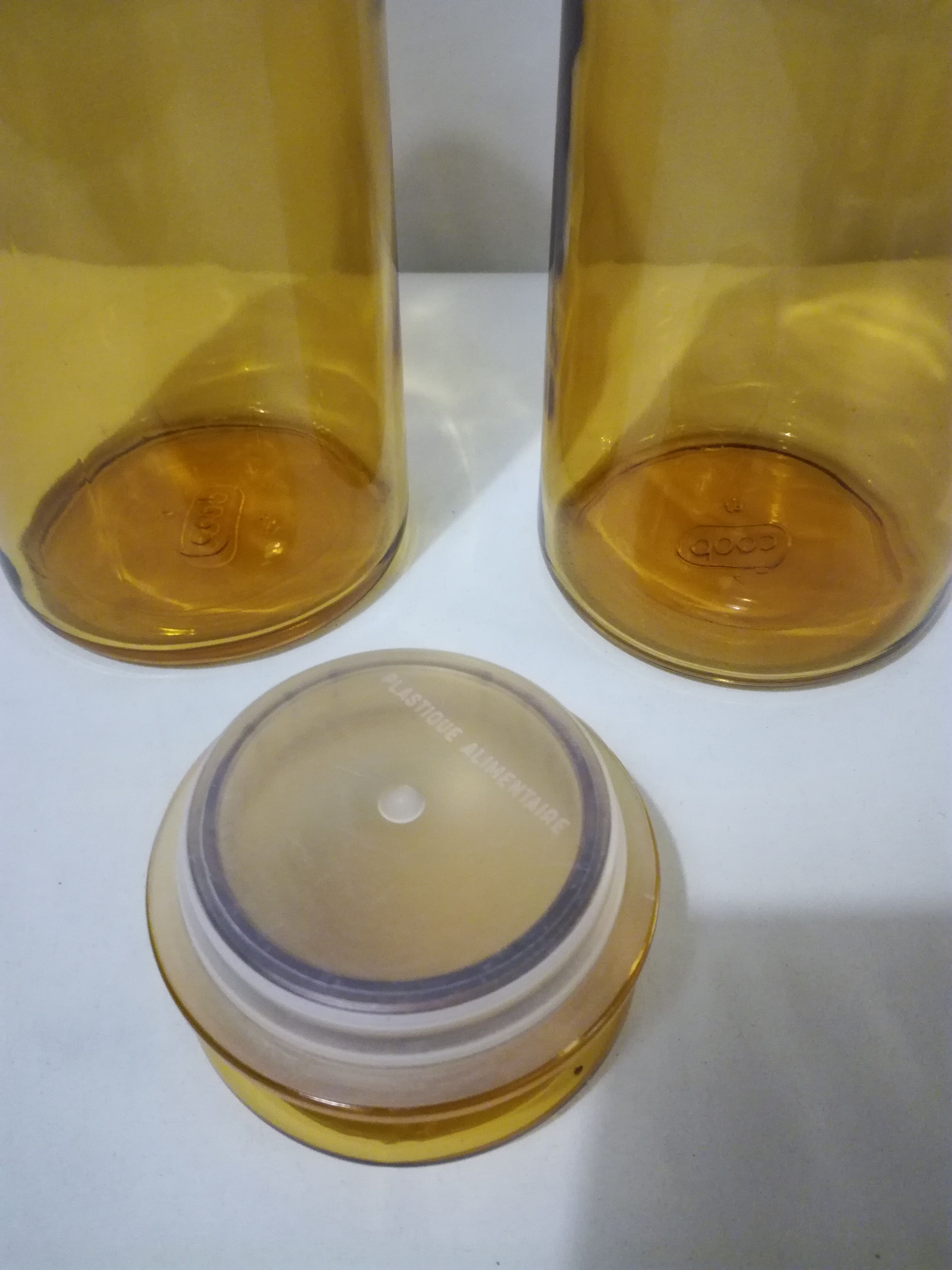 Two amber jars