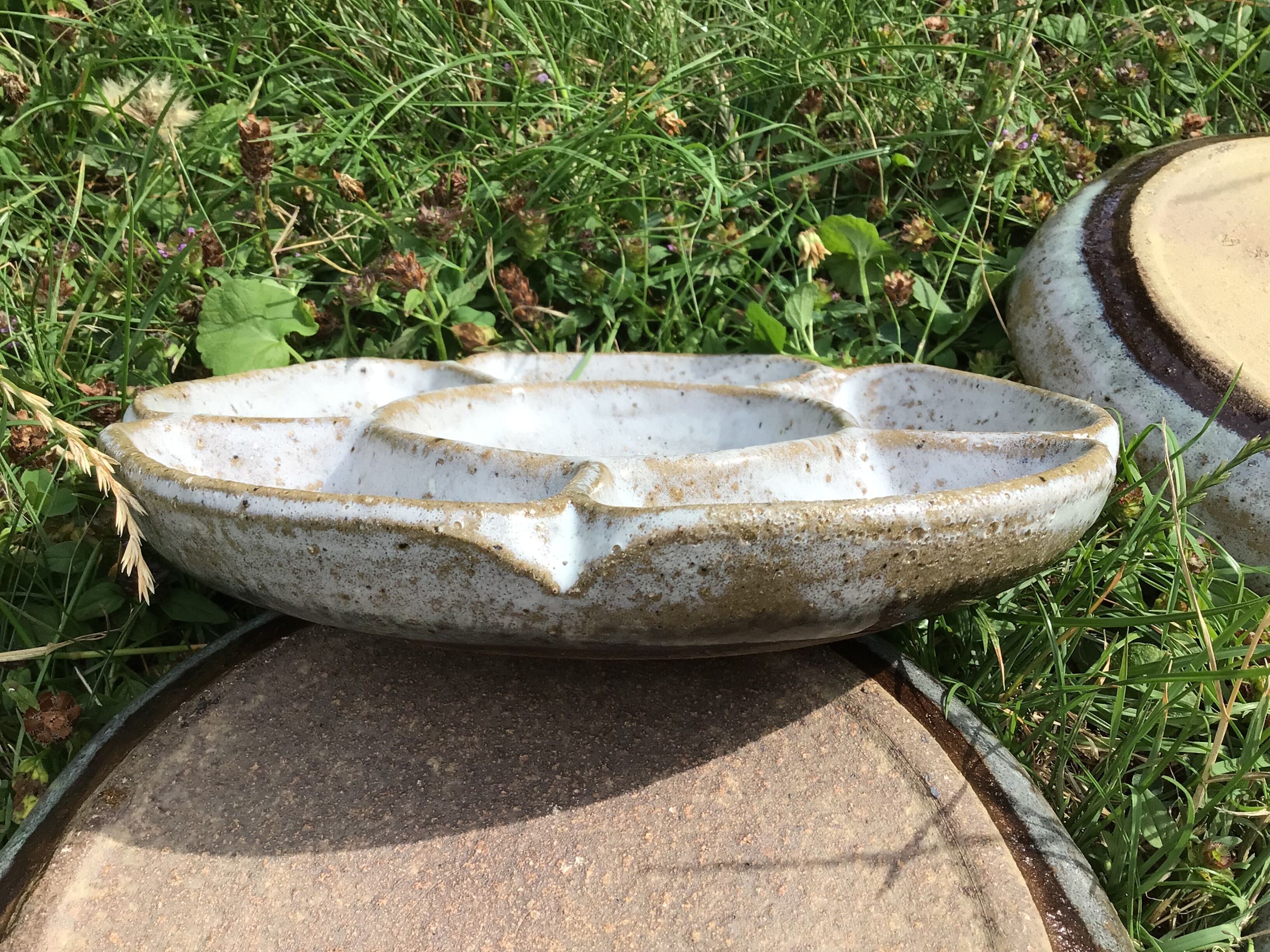 4 White compartmentalized handmade stoneware plates