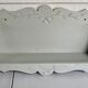Scalloped wooden shelf
