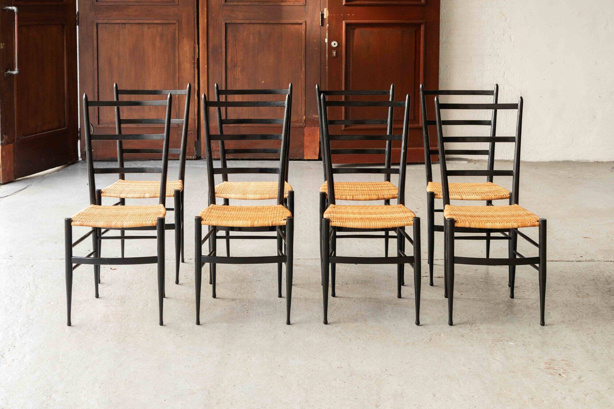 Set of 8 dining chairs ‘Baletta’ by Enrico Delmonte