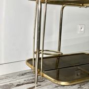 Golden tubing bar and smoked glass top circa 60/70