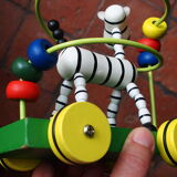 Old wooden toy, zebra car, to pull and push