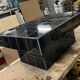 Black tiled coffee table and midnight blue grout