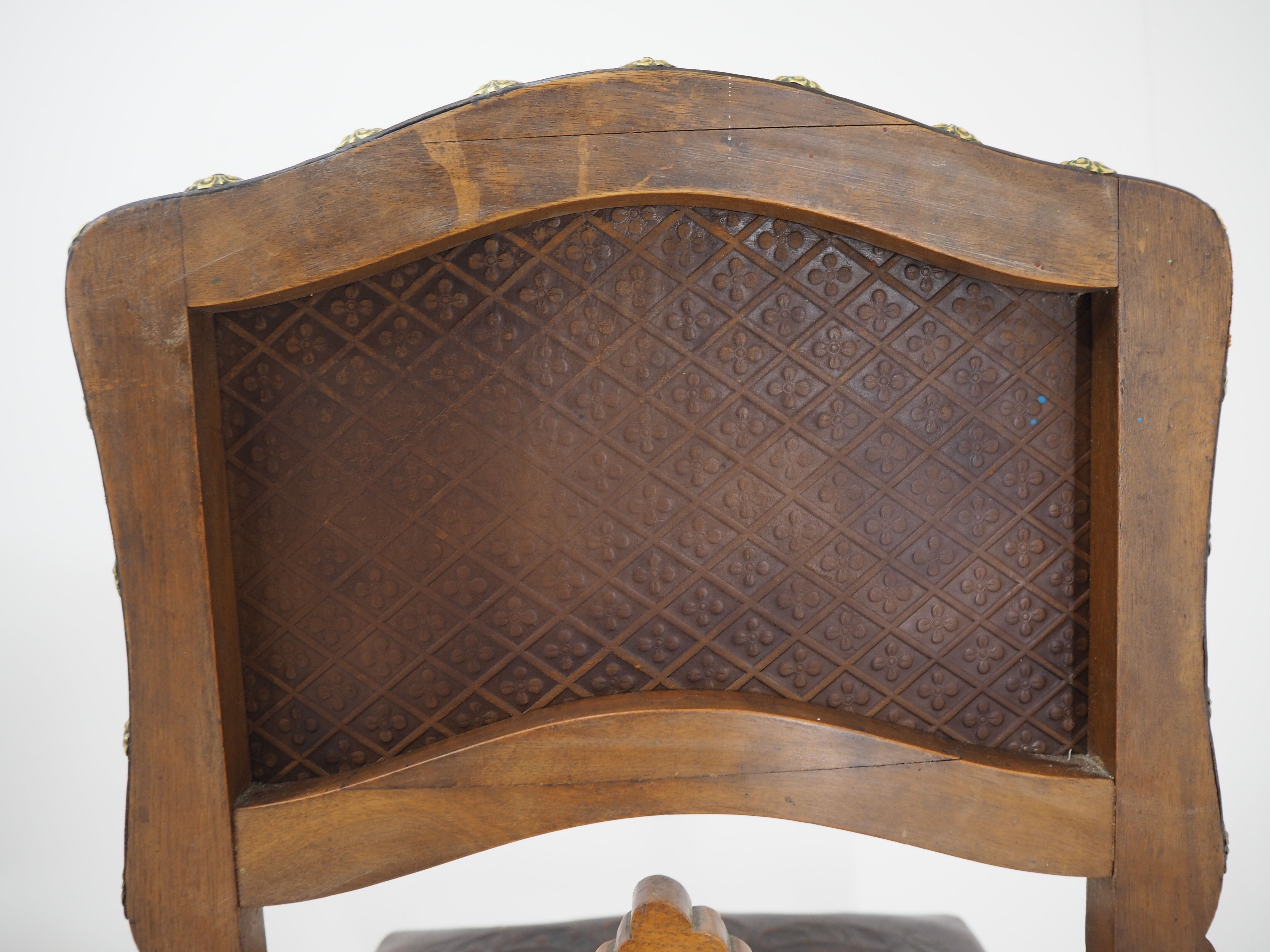 Pair of Antique Embossed Leather Chairs