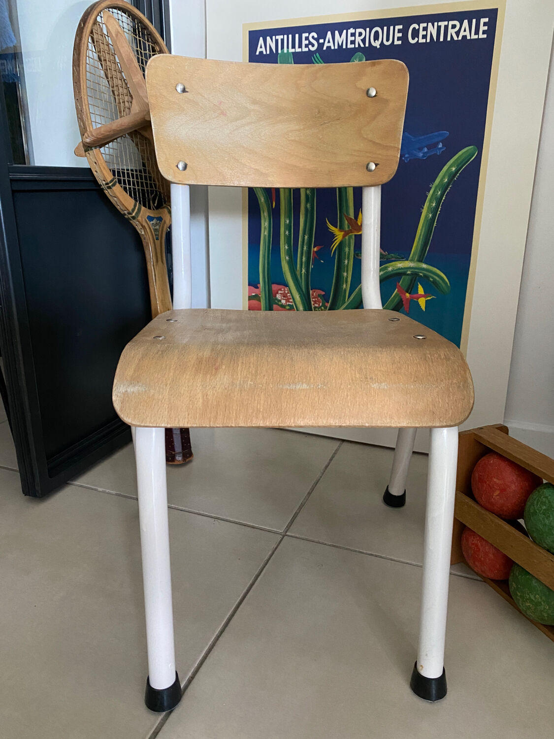 Old wooden and metal children's school chair