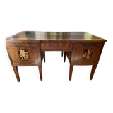 Antique Empire-style desk in burr veneer, green leather, with a dash.
