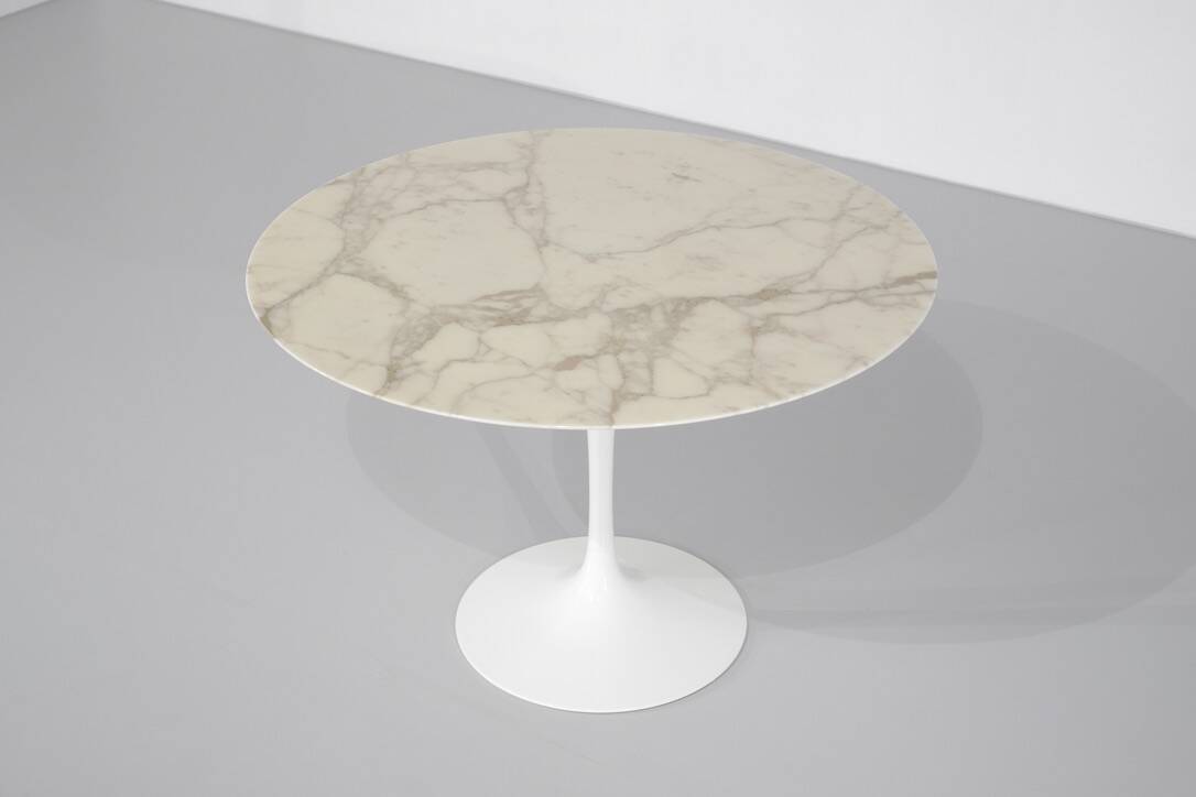 Tulip dining table in marble by Eero Saarinen for Knoll International.