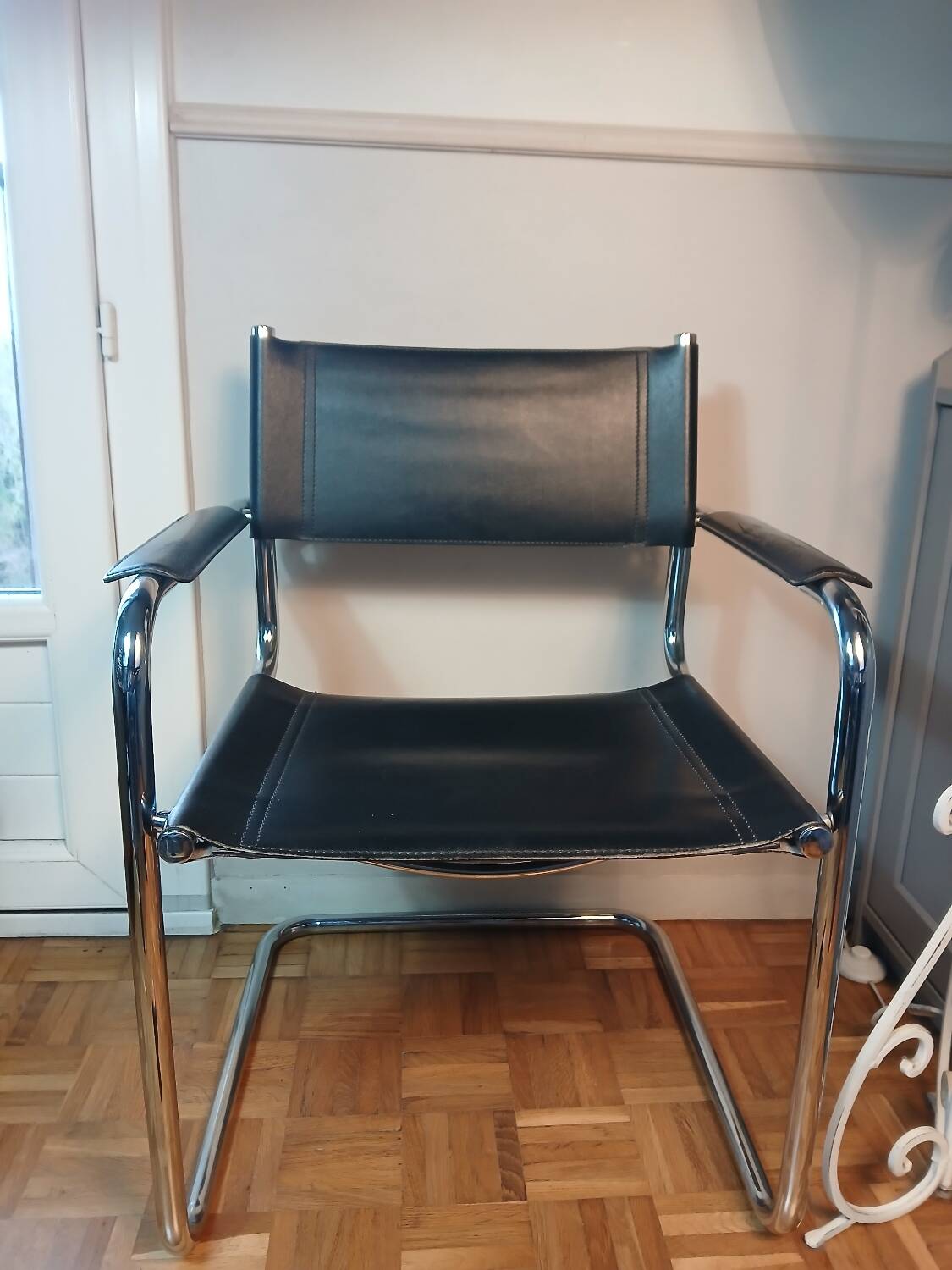 Black leather cantilever chair with chrome steel – Modernist design