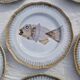 Set of 9 Saint Amand flat plates with fish decor