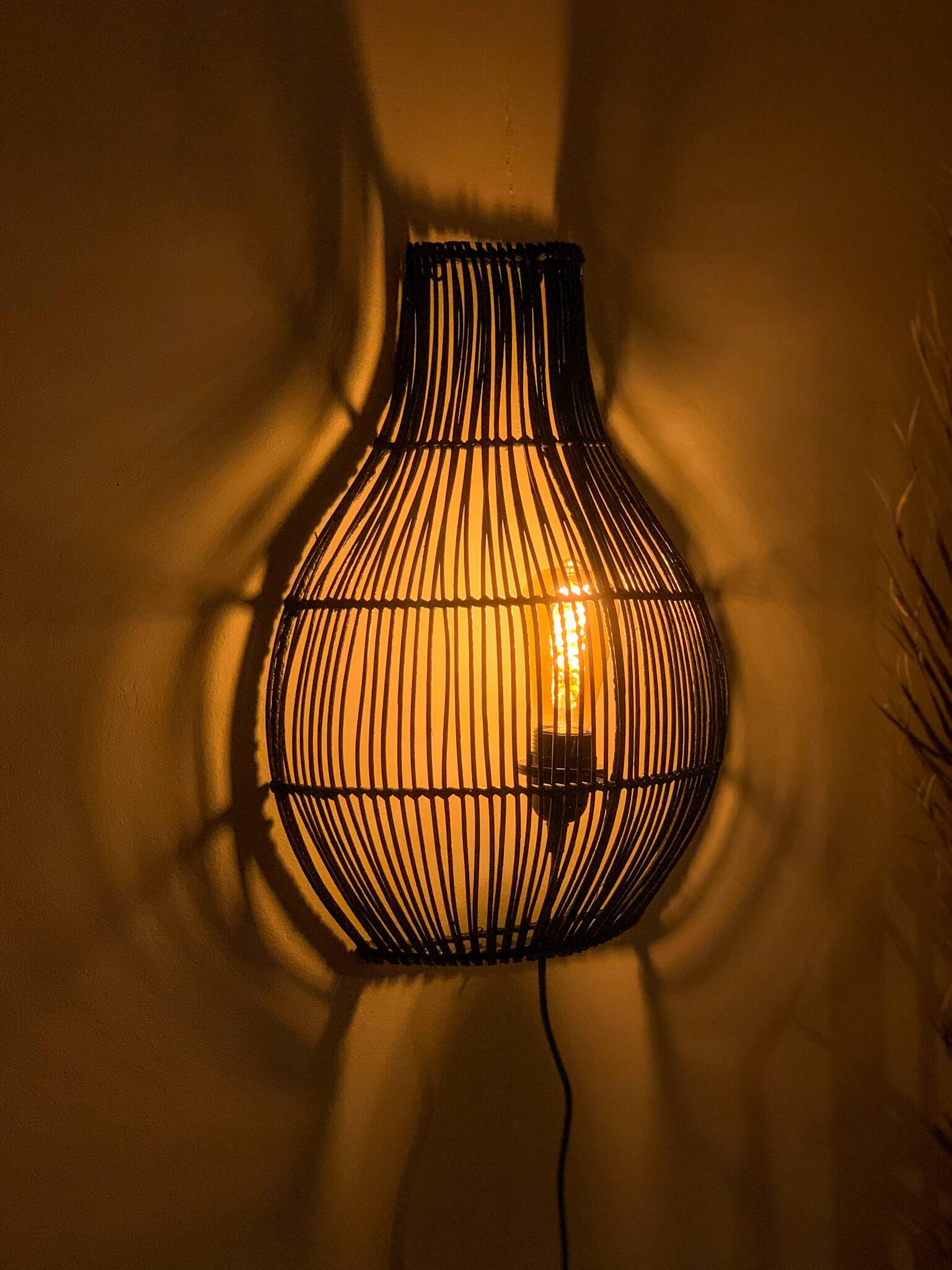 Black rattan wall light