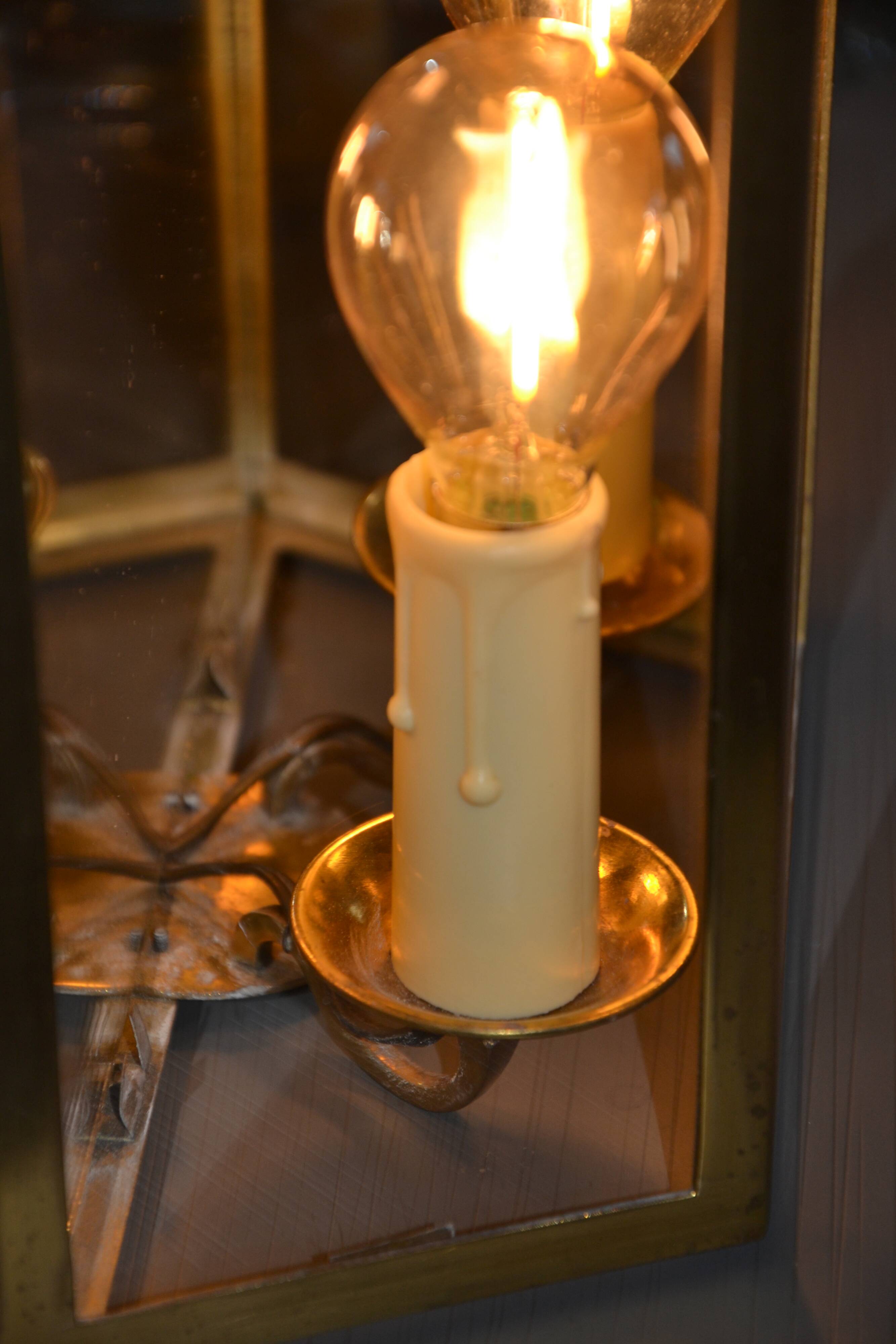 Antique glass wall light in brass