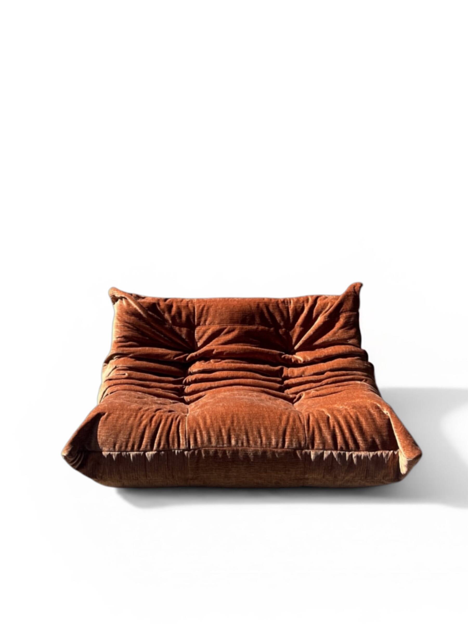 Two-seater Togo sofa in terracotta velvet, Ducaroy first edition 1970.