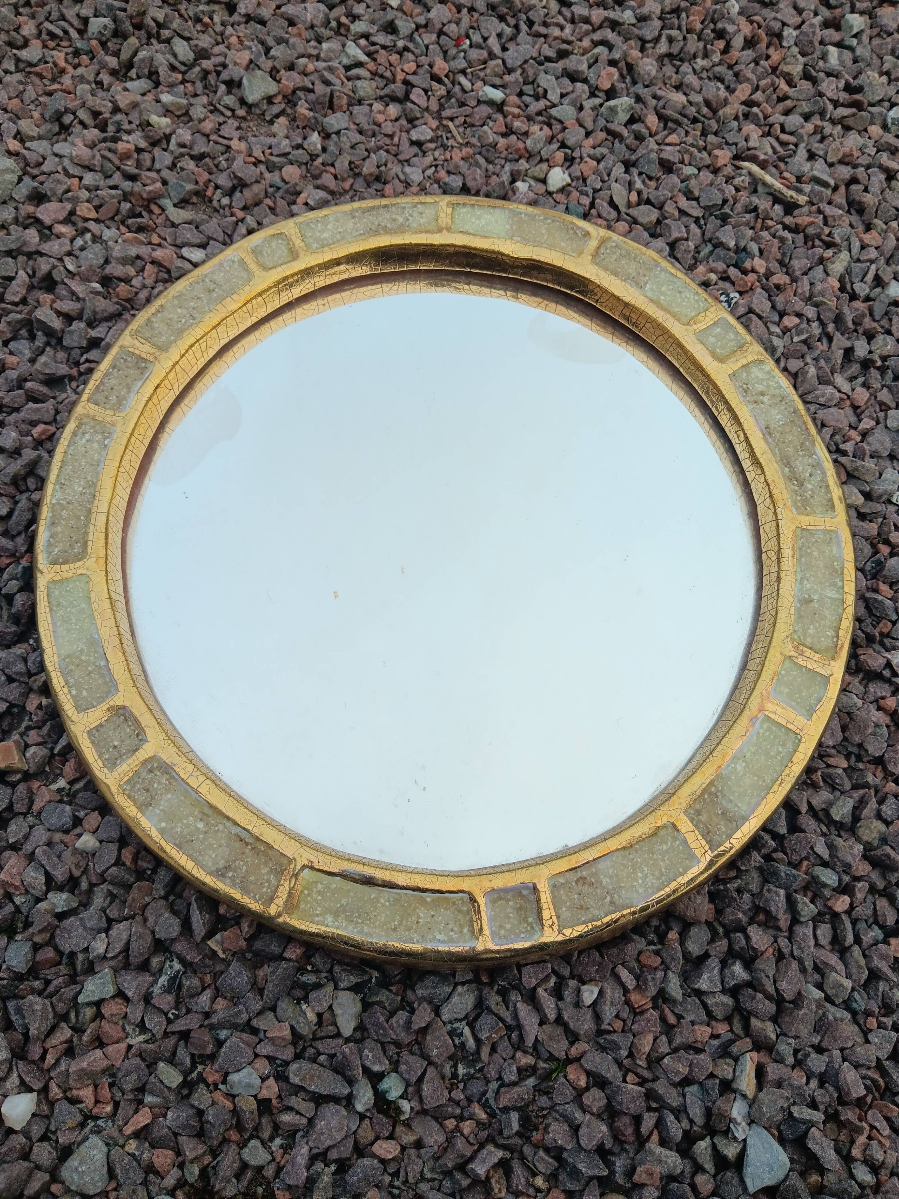 Ceramic mirror "gears" by Mithé Espelt