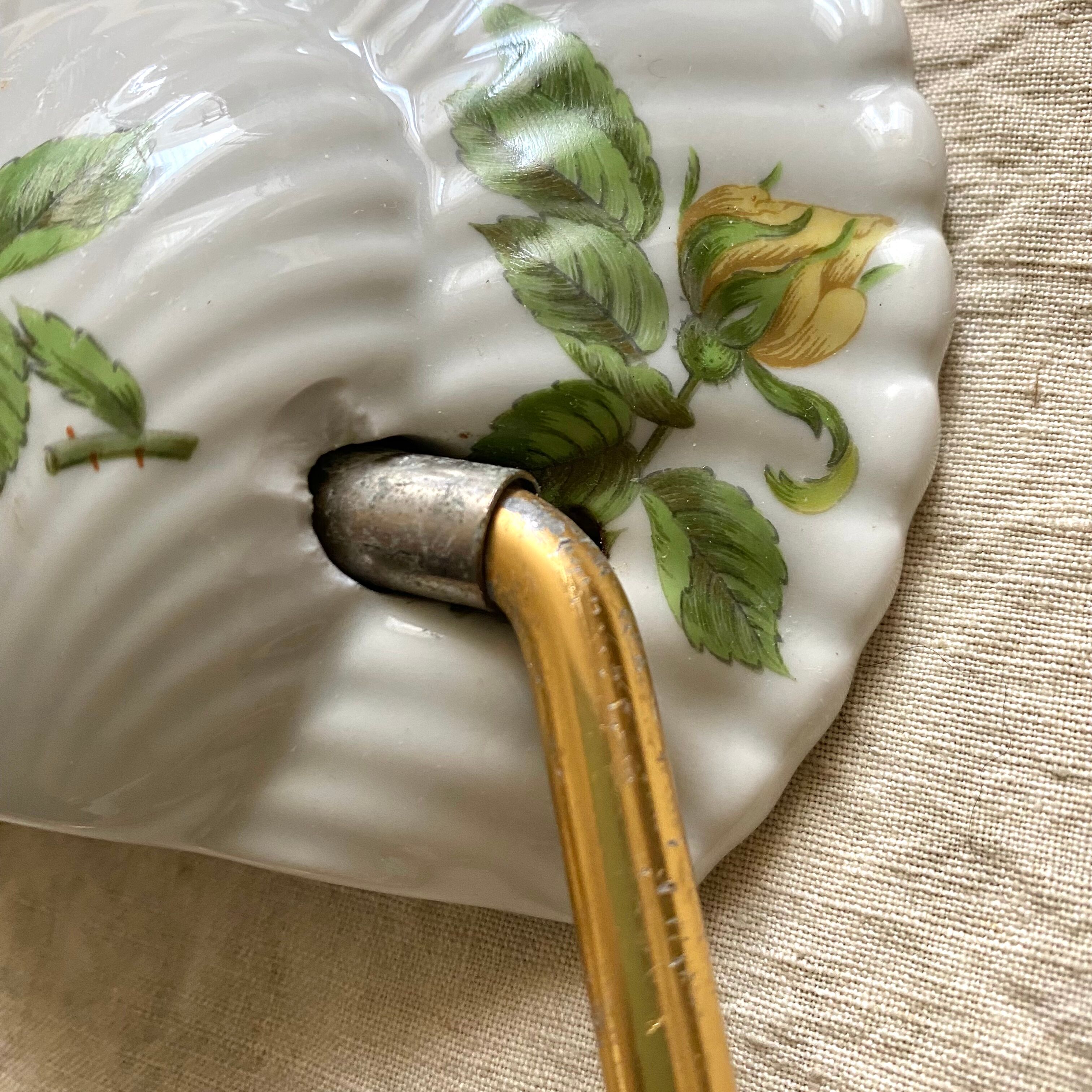 Old napkin holder in shell porcelain