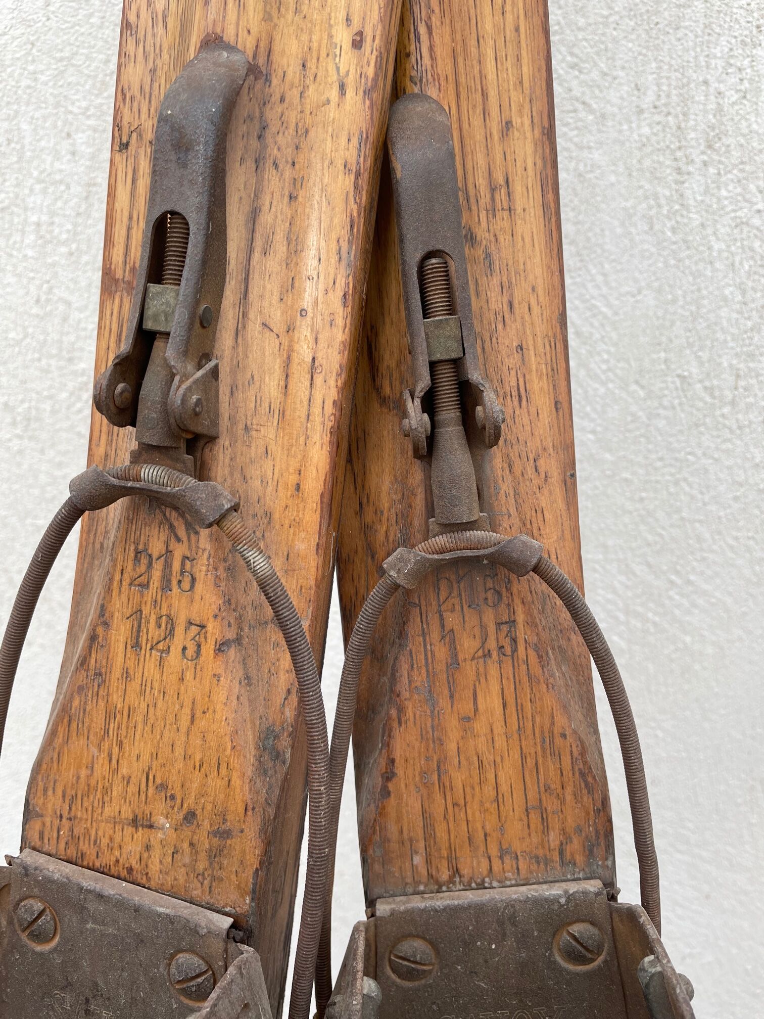 Wooden ski and its sticks