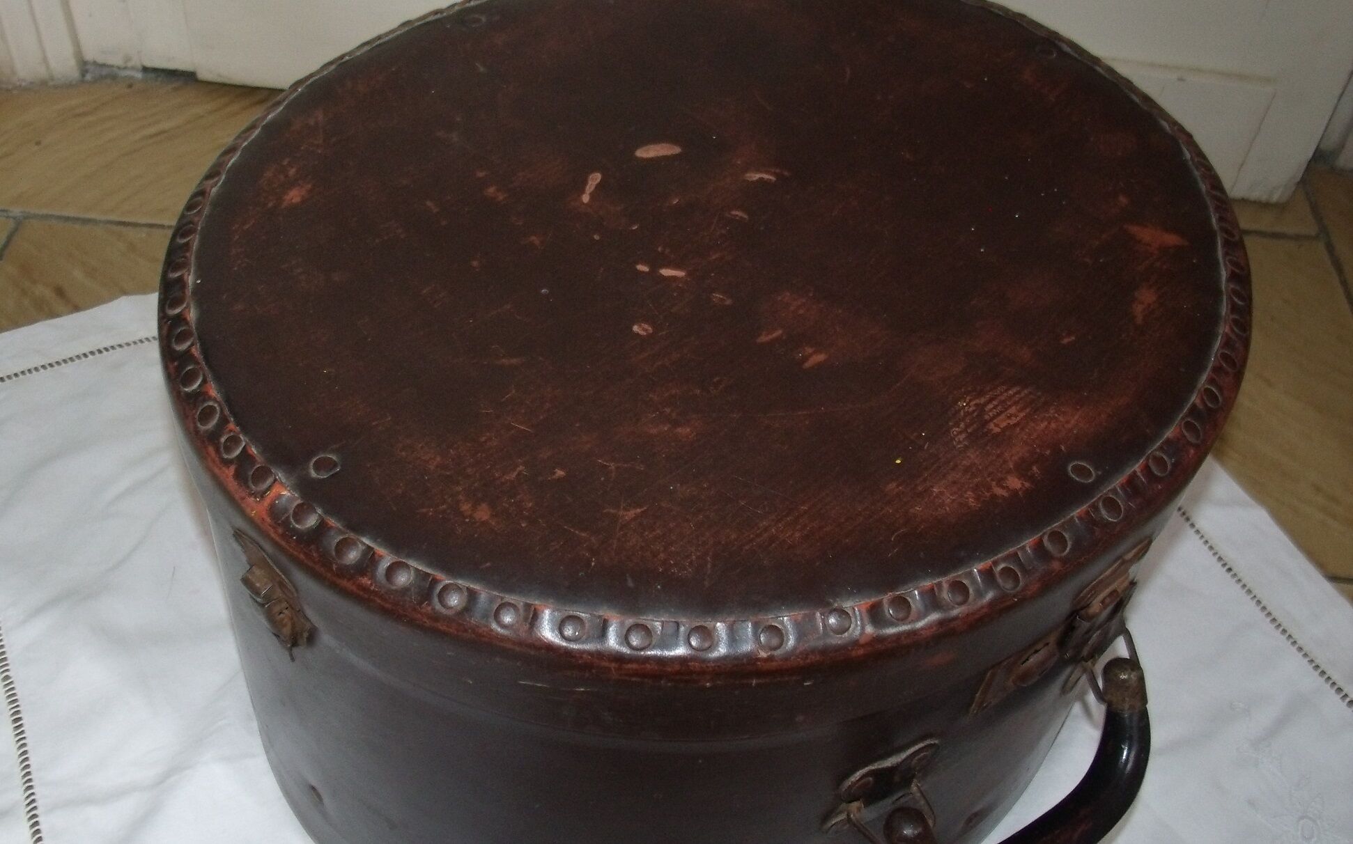 Studded old leather hat box