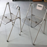 Pair of modern folding chairs in plexiglass