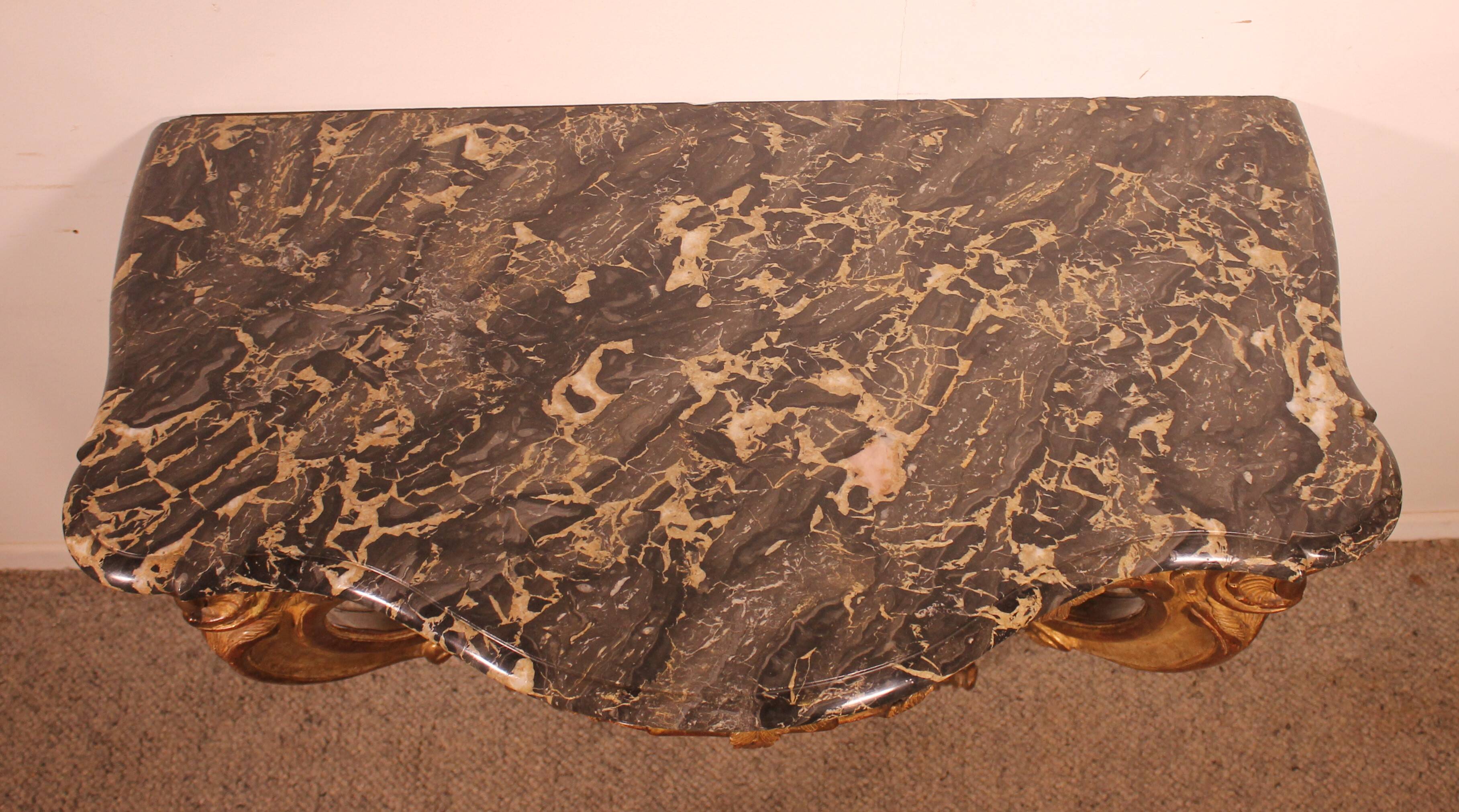 Louis XV period console in gilded wood