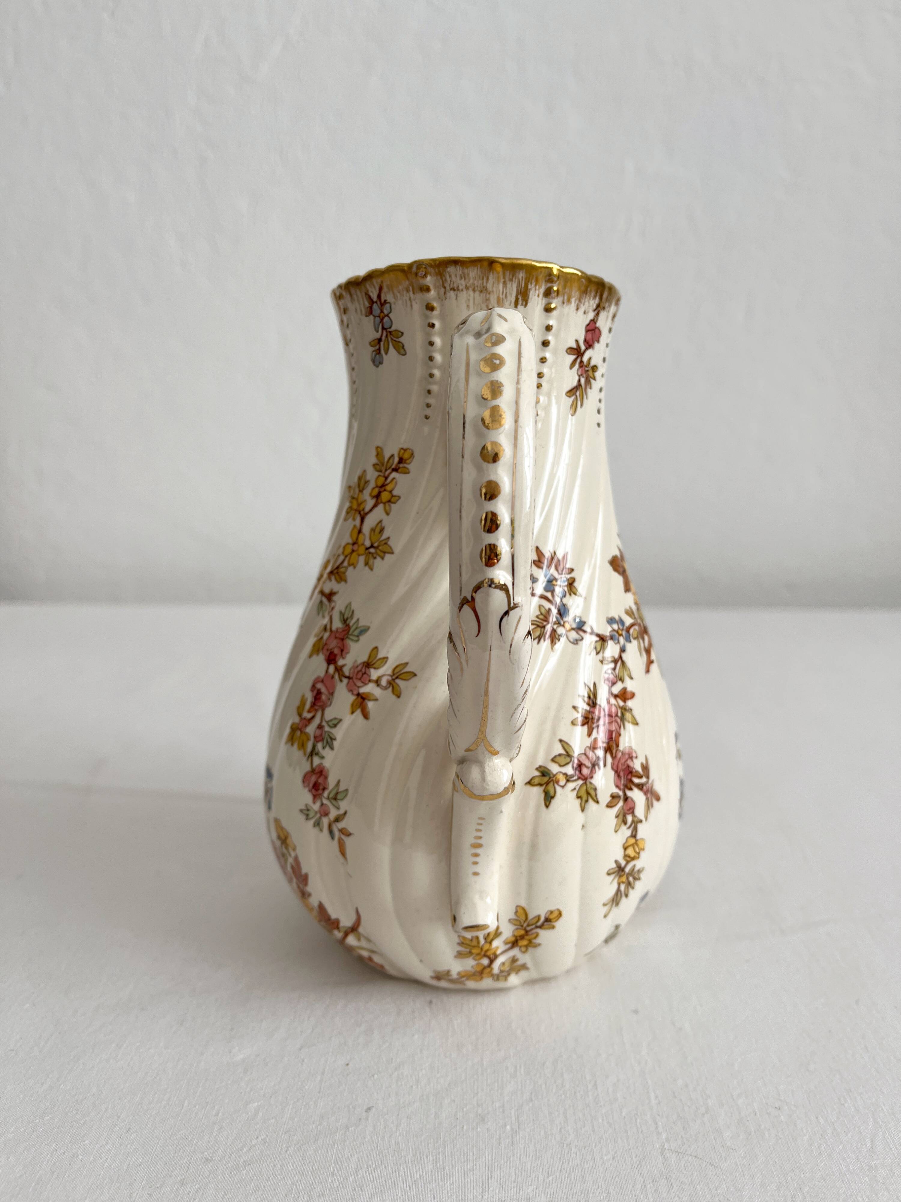 Polychrome ironstone milk jug "Louis XV" U&C Sarreguemines