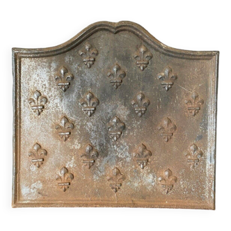 18th century cast iron fireback decorated with fleur-de-lis