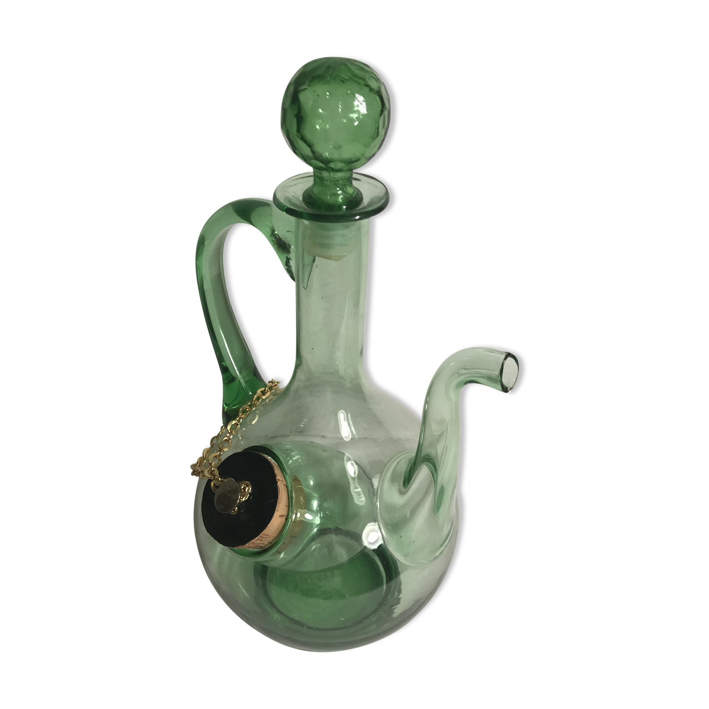 Old refreshing carafe pourer in green blown glass with vintage cap