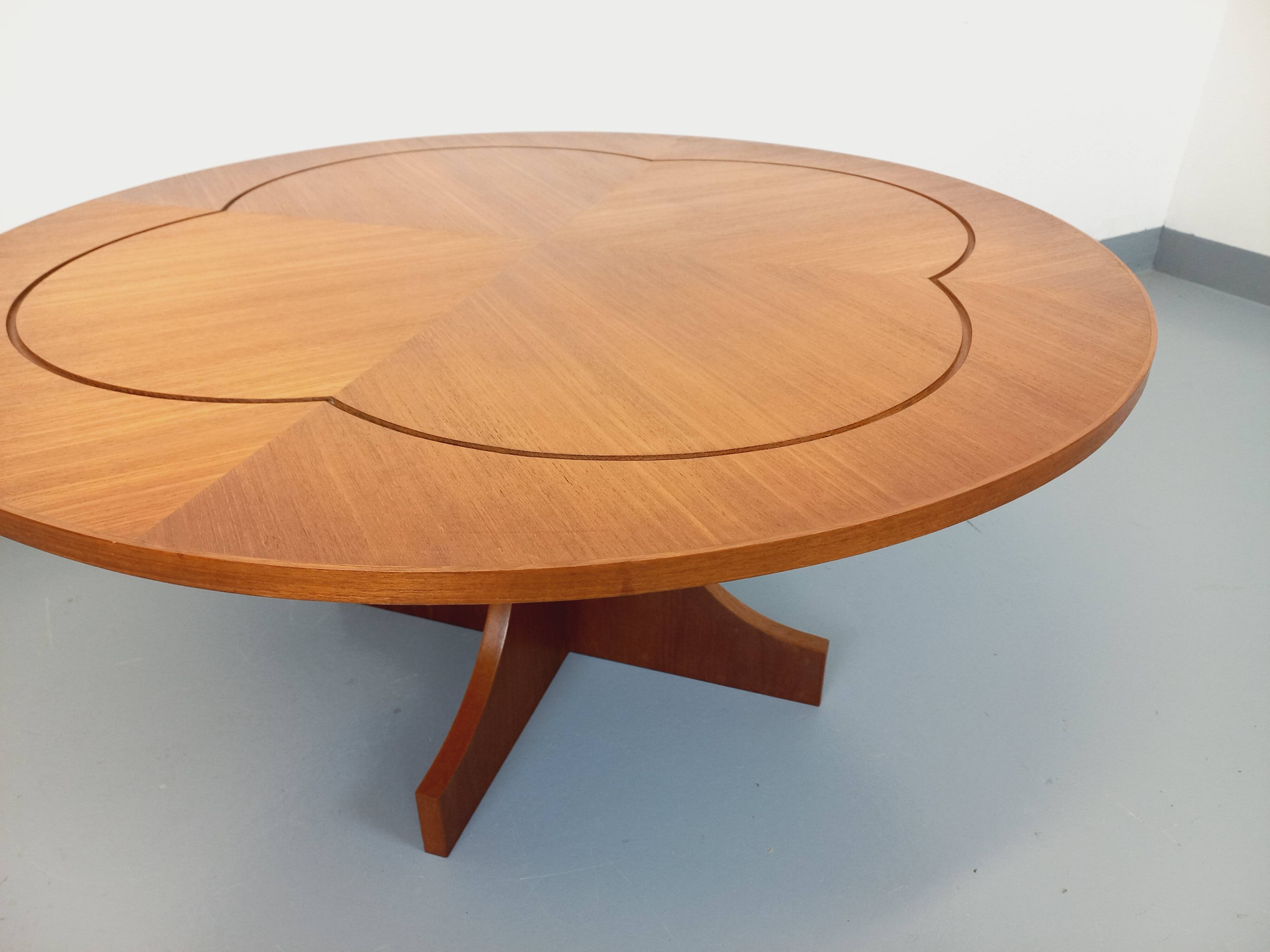 Vintage English round teak coffee table from the 1960s