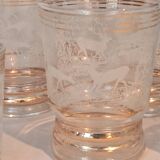 Service of 14 gold-plated and engraved glasses with a deer in the woods design from 1950