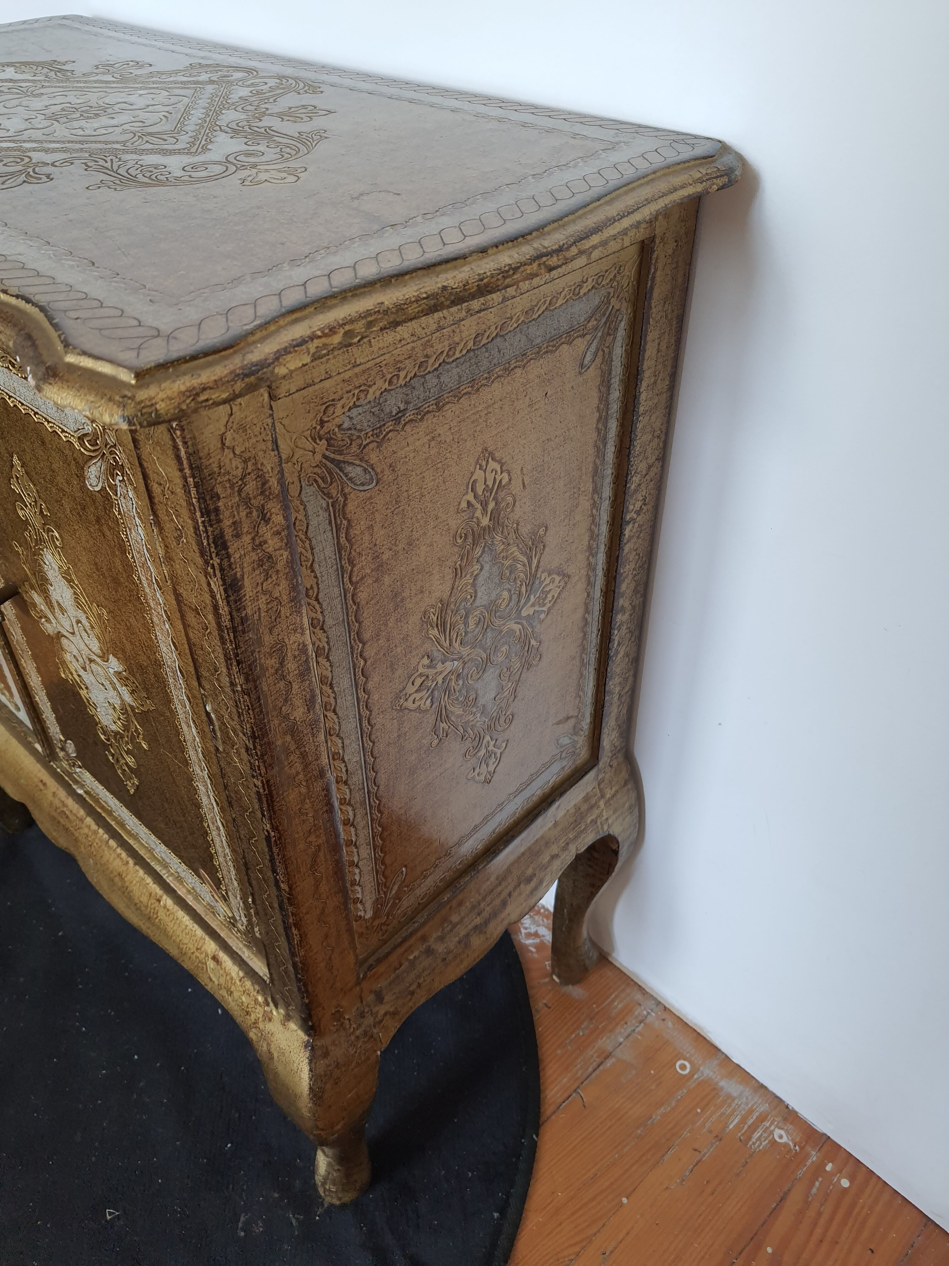 Florentine chest of drawers