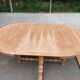 Round extendable farmhouse dining table, stripped, Louis XIII style from the 1960s.