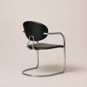 Set of eight cantilever chairs in black faux leather and chrome steel — c. 1980