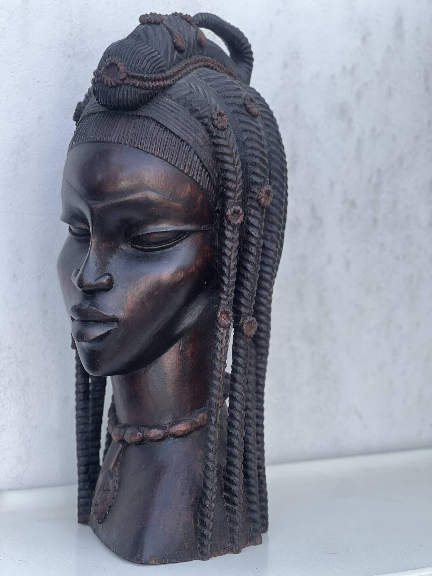Large wooden bust of an African woman.